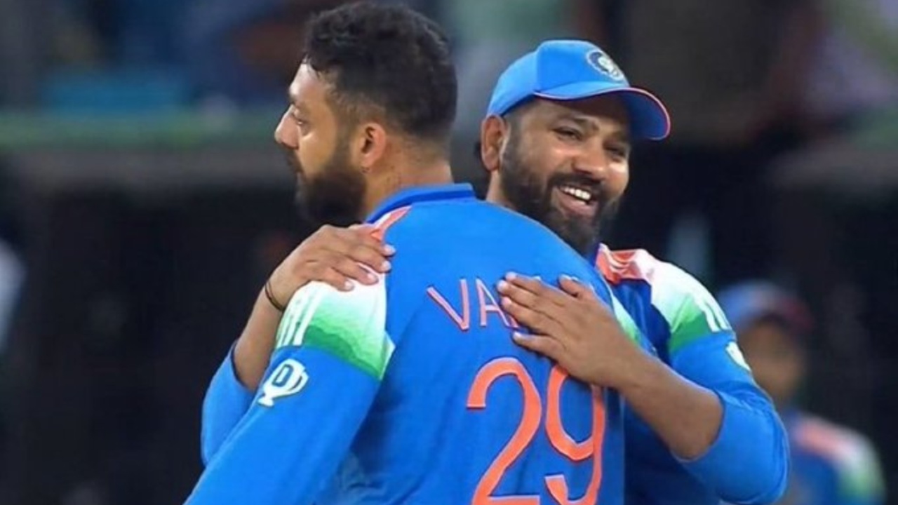 Varun Chakravarthy and Rohit Sharma.